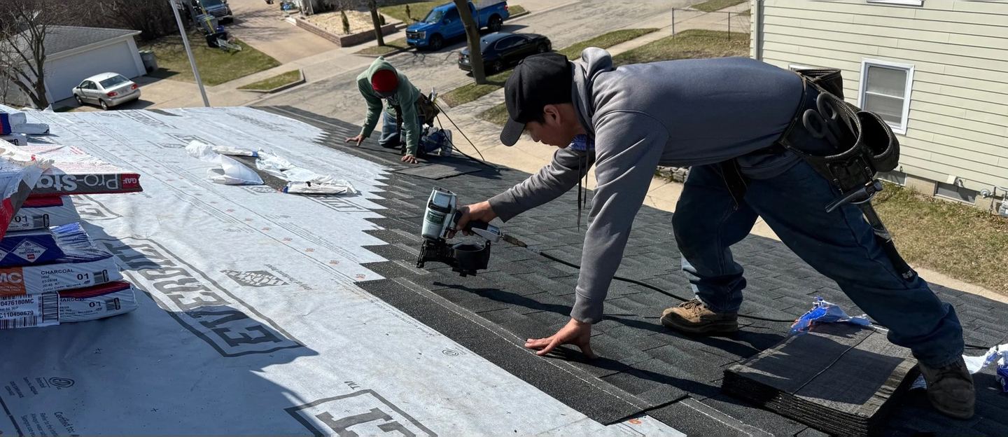 Brew City crew at work on a shingle roof